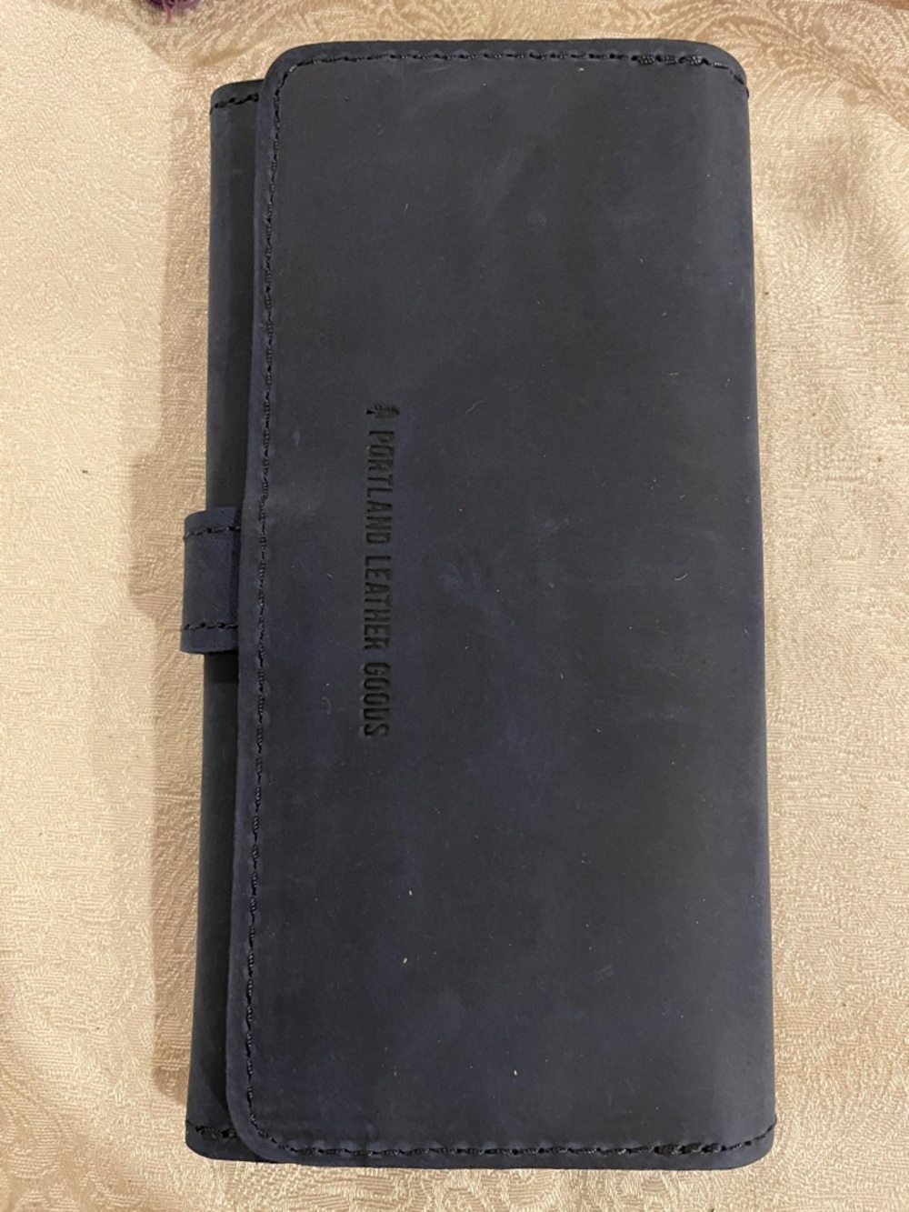 Portland Leather Black Trifold Wallet with snap tab closure